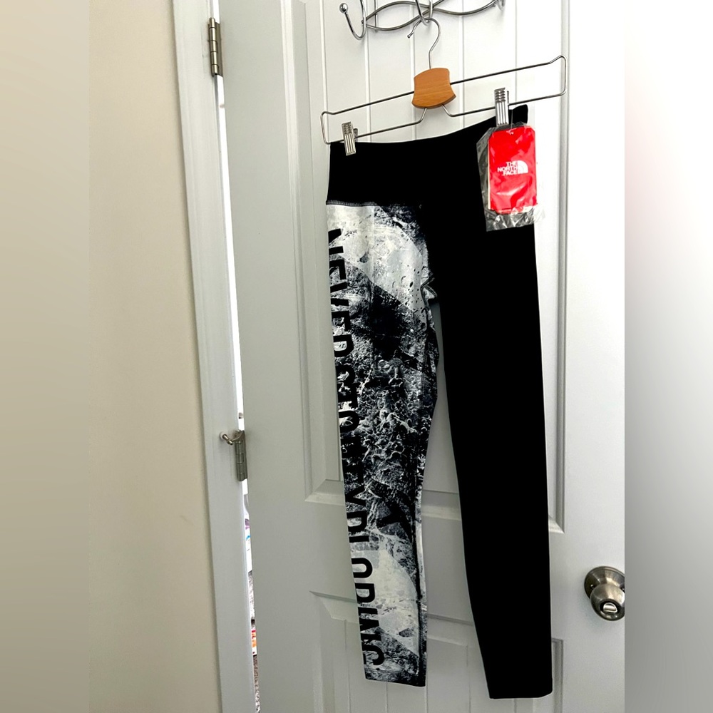 Workout leggings, “never stop exploring”